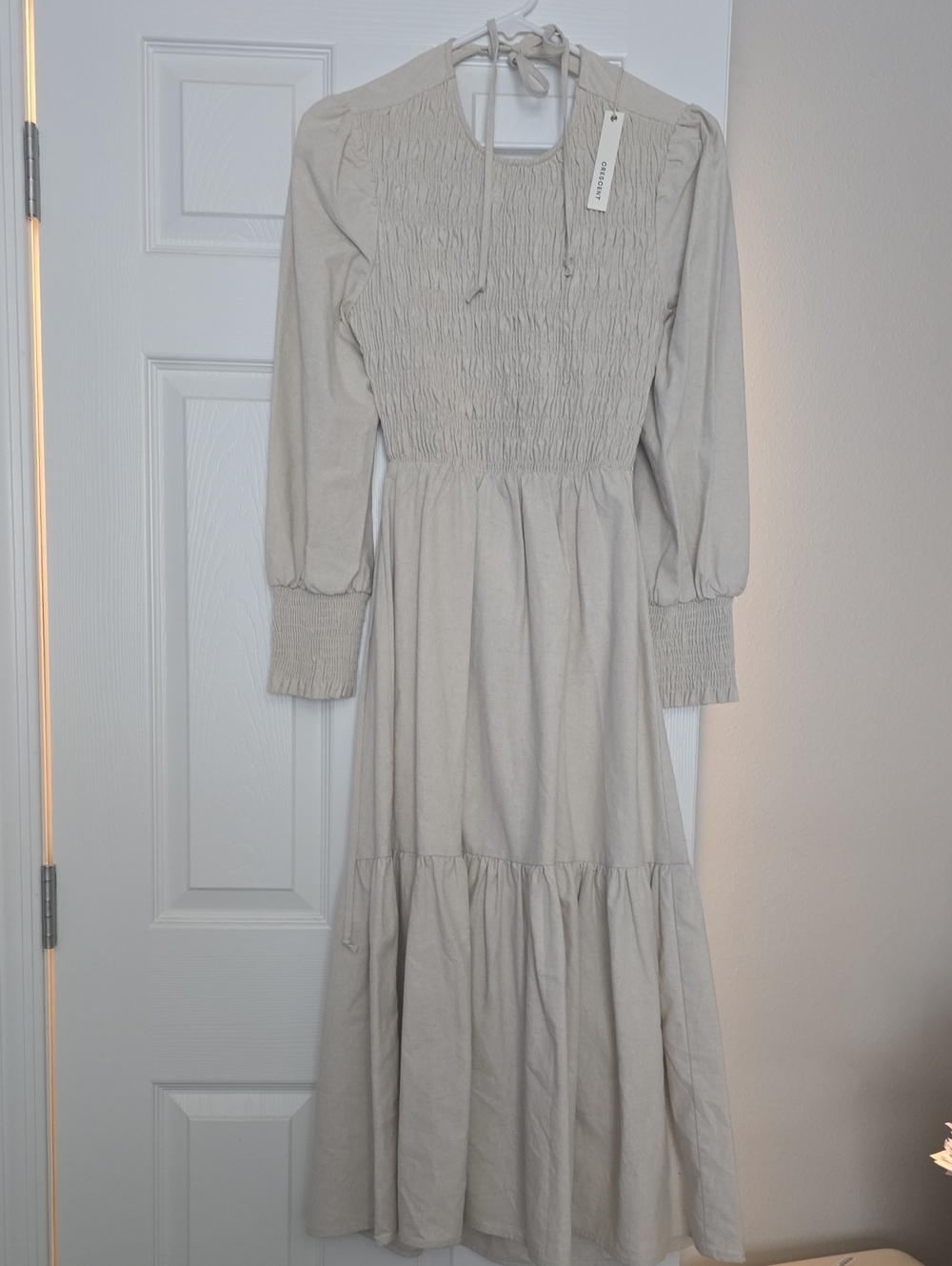 Crescent Smocked Dress in Soft Beige-Cream